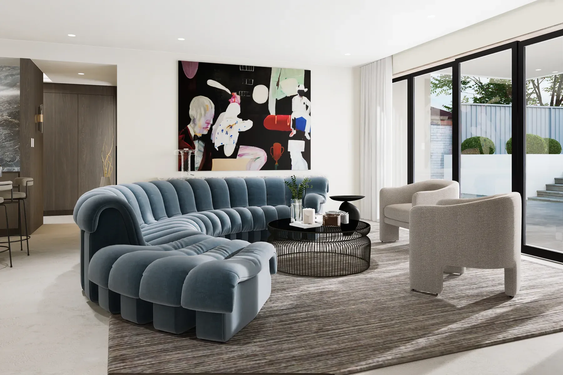 Northbridge &mdash; living room with curved blue velvet sectional and colourful abstract artwork